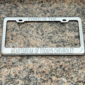 BOLD Ford Chrome License Plate Frame "Ford is the Heartbreak of Today's Chev..."